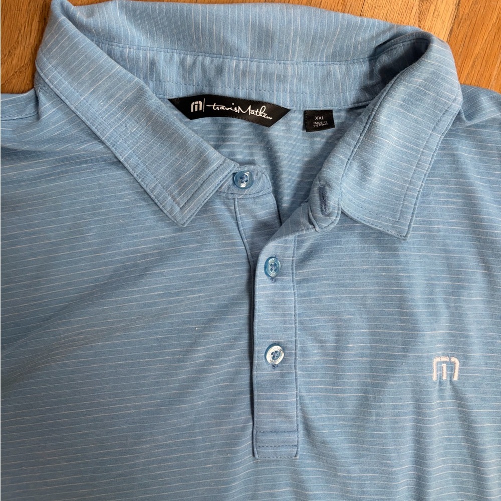 Travis Mathew Striped Sky Blue Short-Sleeve Polo